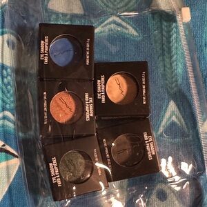MAC Eyeshadow Set with Blue, Gold, Green, and Brown Shades